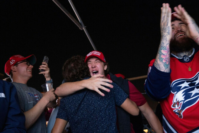 supporters-of-republican-presidential-nominee-former-president-donald-trump-react-to-news-that-trump-won-the-state-of-georgia-during-a-watch-party-in-washington-wednesday-nov-6-2024-ap-photonat