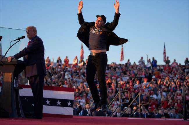 elon-musk-jumps-on-the-stage-as-republican-presidential-nominee-former-president-donald-trump-speaks-at-a-campaign-rally-at-the-butler-farm-show-saturday-oct-5-2024-in-butler-pa-ap-photoevan