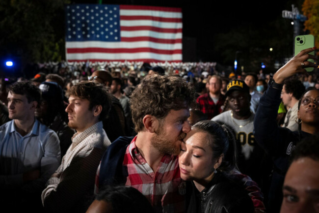 gil-thompson-kisses-his-girlfriend-ava-bowman-thomas-as-the-polling-results-come-in-at-vice-president-kamala-harris-election-night-event-at-howard-university-in-washington-on-nov-5-2024-angelina