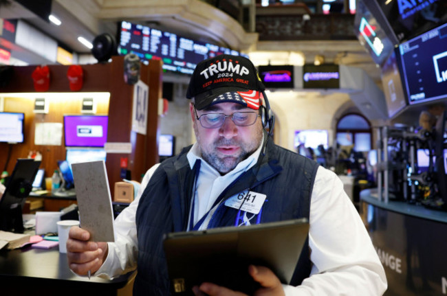 new-york-united-states-06th-nov-2024-trump-merchandise-is-worn-by-traders-working-on-the-floor-of-the-new-york-stock-exchange-on-wall-street-the-morning-after-election-day-on-wednesday-november-6