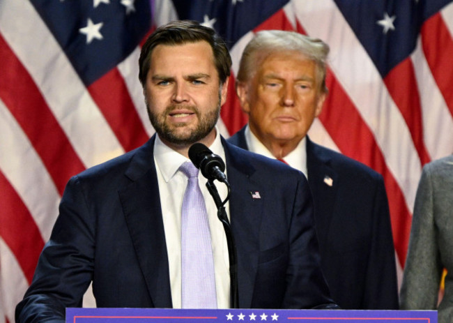 palm-beach-united-states-05th-nov-2024-former-united-states-president-donald-trump-listens-as-republican-vp-nominee-jd-vance-delivers-speaks-from-the-palm-beach-convention-center-at-the-trump-camp