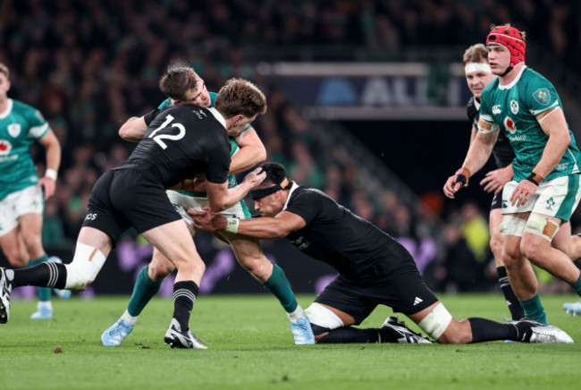 garry-ringrose-is-tackled-high-by-jordie-barrett-resulting-in-a-yellow-card