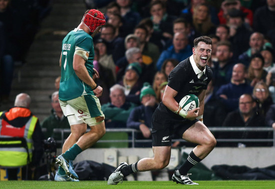 will-jordan-celebrates-scoring-their-first-try-as-josh-van-der-flier-looks-on-dejected