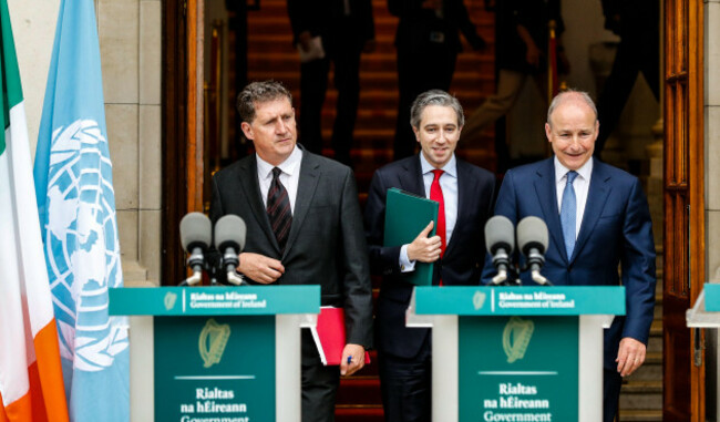 left-to-right-minister-eamon-ryan-taoiseach-simon-harris-and-tanaiste-micheal-martin-arrive-to-speak-to-the-media-during-a-press-conference-outside-the-government-buildings-dublin-to-announce-the