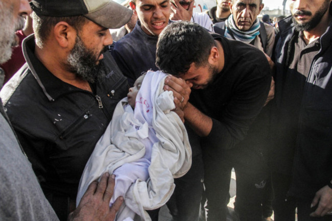 gaza-city-november-12-2024-gaza-city-the-gaza-strip-palestine-a-body-of-a-palestinian-baby-is-brought-to-the-al-ahli-baptist-hospital-following-an-israeli-attack-at-sabra-neighborhood-in-gaza-c