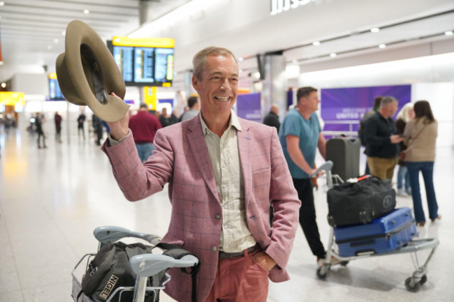 nigel-farage-arrives-at-heathrow-airport-london-after-taking-part-in-the-itv-series-im-a-celebrity-get-me-out-of-here-in-australia-picture-date-wednesday-december-13-2023