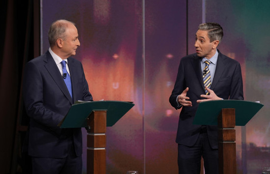 tanaiste-and-leader-of-fianna-fail-micheal-martin-left-and-taoiseach-and-leader-of-fine-gael-simon-harris-during-the-general-election-leaders-debate-at-rte-studios-in-montrose-dublin-rtes-upfr