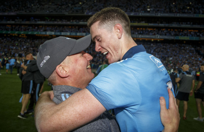 brian-fenton-celebrates-with-manager-jim-gavin-after-the-game