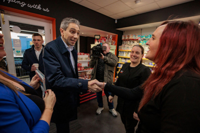 taoiseach-and-leader-of-fine-gael-simon-harris-centre-left-is-introduced-by-local-fine-gael-candidate-dympna-daly-finn-to-soilse-pharmacy-staff-at-carrick-retail-and-business-park-during-his-visit