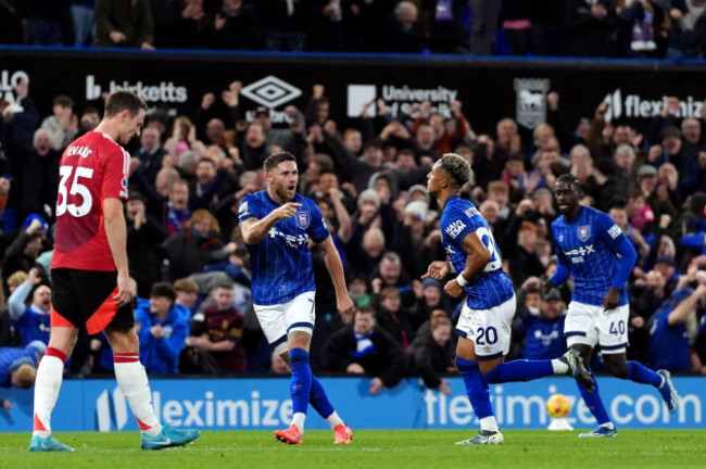 ipswich-towns-omari-hutchinson-2nd-from-right-celebrates-scoring-their-sides-first-goal-of-the-game-during-the-premier-league-match-at-portman-road-ipswich-picture-date-sunday-november-24-2024