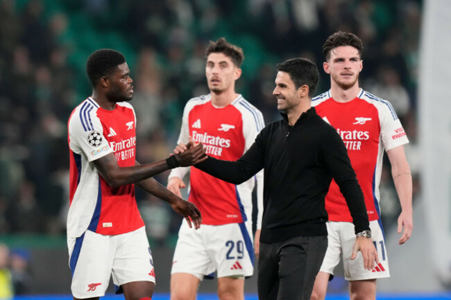 arsenals-players-celebrate-their-teams-5-1-victory-over-sporting-at-the-end-of-a-champions-league-opening-phase-soccer-match-at-the-alvalade-stadium-in-lisbon-tuesday-nov-26-2024-ap-photoarma