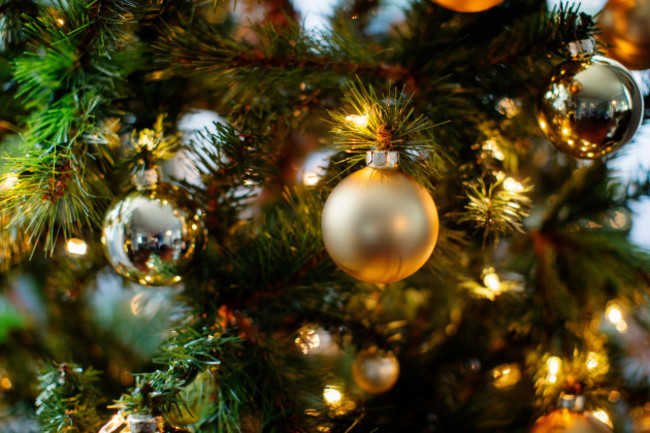 close-up-of-ornaments-and-lights-on-christmas-tree