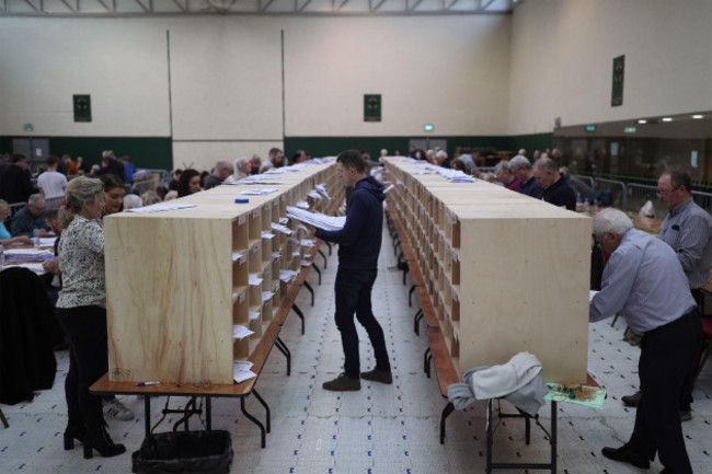 counting-staff-during-the-irish-general-election-count-at-the-nemo-rangers-gaa-club-in-cork-ireland