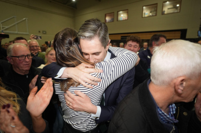 irish-premier-simon-harris-is-hugged-by-his-wife-caoimhe-after-being-re-elected-to-the-dail-parliament-as-a-td-for-wicklow-on-the-first-count-at-the-election-count-centre-at-shoreline-leisure-greyston