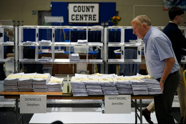 ballots-for-stephen-donnelly-and-jennifer-whitmore-are-stacked-on-a-table-during-counting-at-shoreline-leisure-greystones-in-co-wicklow-after-voters-went-to-the-polls-to-elect-174-tds-across-43-const