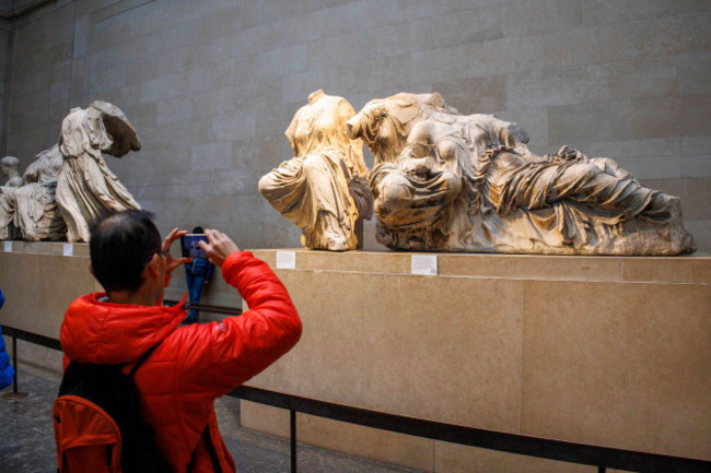 london-uk-30th-dec-2023-visitors-at-the-british-museum-view-ancient-sculptures-in-the-parthenon-galleries-they-are-also-referred-to-as-the-elgin-marbles-after-lord-elgin-took-them-to-london-betwe