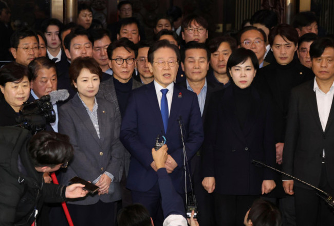 south-koreas-main-opposition-democratic-party-leader-lee-jae-myung-center-speaks-at-the-national-assembly-in-seoul-south-korea-wednesday-dec-4-2024-kim-ju-hyungyonhap-via-ap