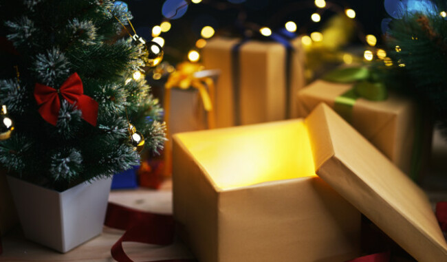 openchristmasboxgiftbesidessmallchristmastree-glowinglight