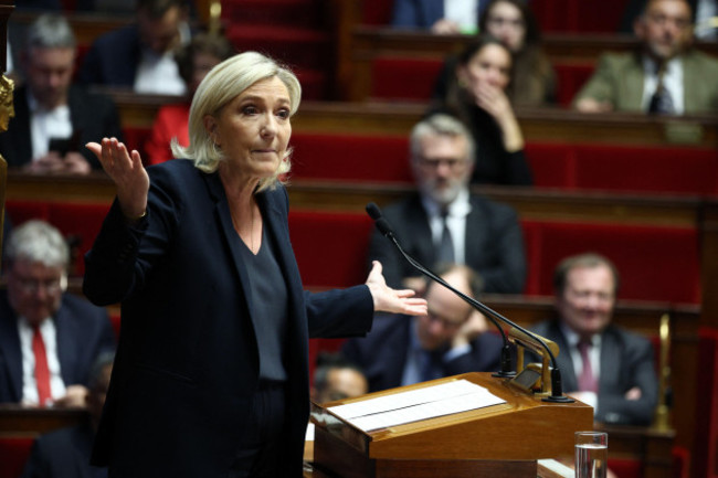 president-of-french-far-right-party-rassemblement-national-rn-marine-le-pen-during-the-debate-prior-to-the-no-confidence-votes-on-prime-minister-barniers-administration-at-the-national-assembly-in