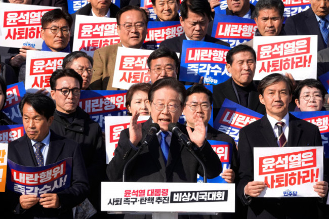 south-koreas-main-opposition-democratic-party-leader-lee-jae-myung-bottom-center-speaks-during-a-rally-against-president-yoon-suk-yeol-at-the-national-assembly-in-seoul-south-korea-wednesday-dec