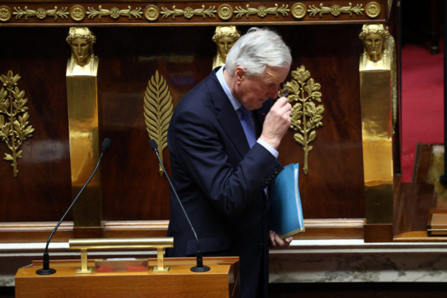 french-prime-minister-michel-barnier-during-the-debate-prior-to-the-no-confidence-votes-on-prime-minister-barniers-administration-at-the-national-assembly-in-paris-france-on-december-4-2024-the-fr