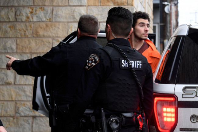 luigi-nicholas-mangione-is-escorted-into-blair-county-courthouse-tuesday-dec-10-2024-in-hollidaysburg-pa-ap-photogary-m-baranec