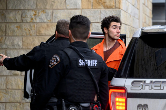 hollidaysburg-pennsylvania-usa-10th-dec-2024-suspected-shooter-luigi-mangione-is-led-into-the-blair-county-courthouse-for-an-extradition-hearing-on-tuesday-dec-10-2024-in-hollidaysburg-penns