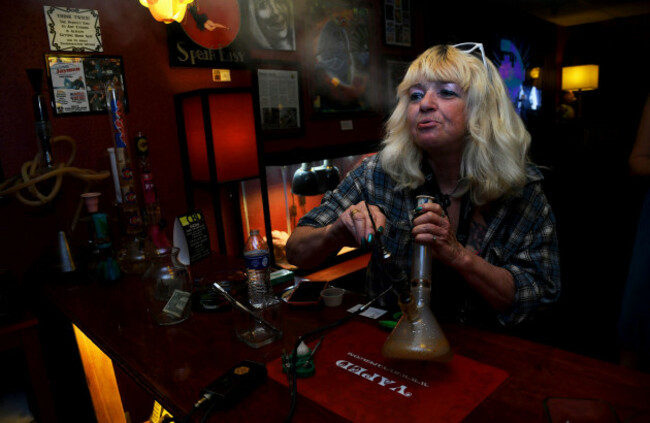 in-this-april-12-2017-photo-linda-wood-smokes-a-concentrated-form-of-marijuana-called-a-dab-at-the-speakeasy-vape-lounge-one-of-the-united-states-only-legal-pot-clubs-in-colorado-springs-colo