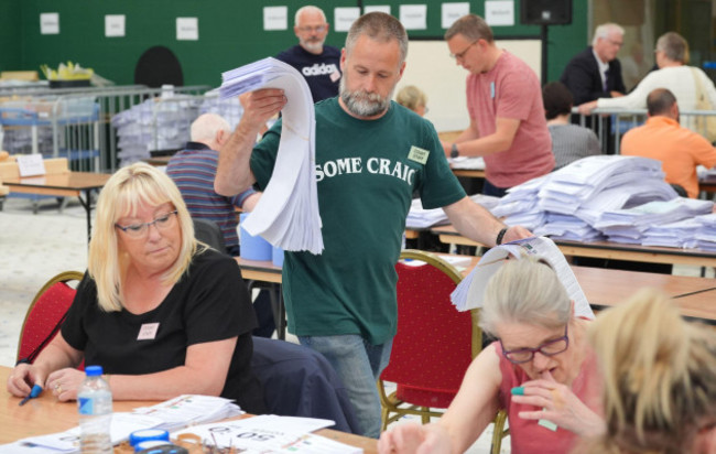 file-photo-dated-13062024-of-count-staff-member-cian-oconnor-left-from-douglas-co-cork-wearing-a-different-novelty-t-shirt-for-each-day-during-vote-counting-in-irelands-european-elections-at-t