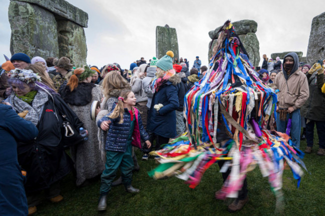 a-hobby-horse-decked-out-in-ribbons-performs-during-the-winter-solstice-celebrations-at-stonehenge-england-saturday-dec-21-2024-ap-photoanthony-upton