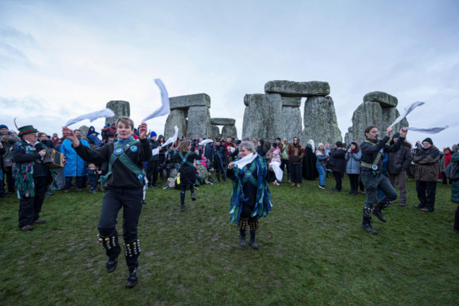 morris-dancers-take-part-in-the-winter-solstice-celebrations-at-stonehenge-england-saturday-dec-21-2024-ap-photoanthony-upton