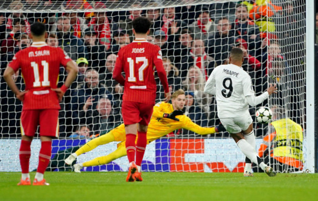 liverpool-goalkeeper-caoimhin-kelleher-rear-saves-a-penalty-from-real-madrids-kylian-mbappe-right-during-the-uefa-champions-league-league-stage-match-at-anfield-liverpool-picture-date-wednesd