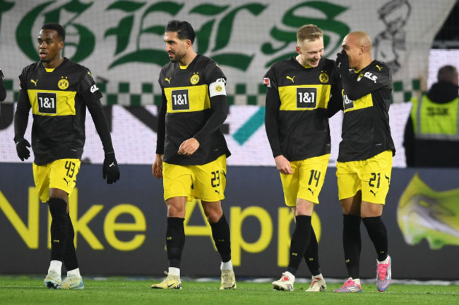 wolfsburg-germany-22nd-dec-2024-soccer-bundesliga-vfl-wolfsburg-borussia-dortmund-matchday-15-volkswagen-arena-dortmunds-maximilian-beier-celebrates-with-dortmunds-donyell-malen-r-after