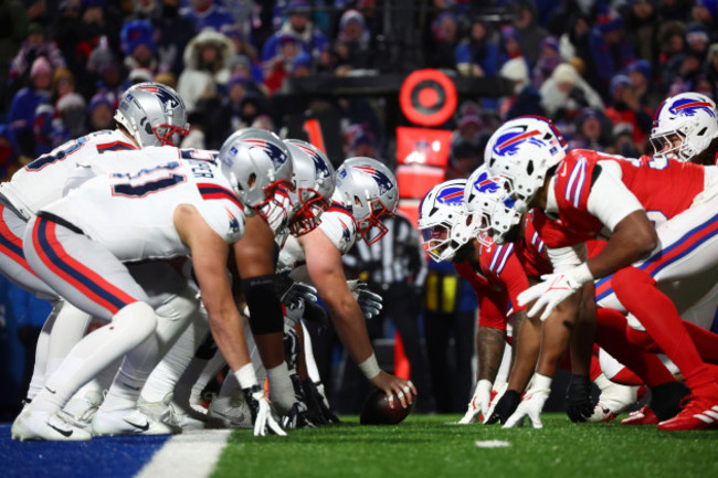 the-new-england-patriots-left-and-buffalo-bills-line-up-at-the-line-of-scrimmage-during-the-second-quarter-of-an-nfl-football-game-sunday-dec-22-2024-in-orchard-park-n-y-ap-photojeffrey-t