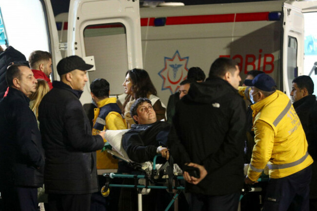 rescuers-transport-wounded-passengers-from-a-medical-plane-after-the-azerbaijani-airline-crashed-near-the-kazakhstani-city-of-aktau-upon-their-arrival-at-the-heydar-aliyev-international-airport-outs