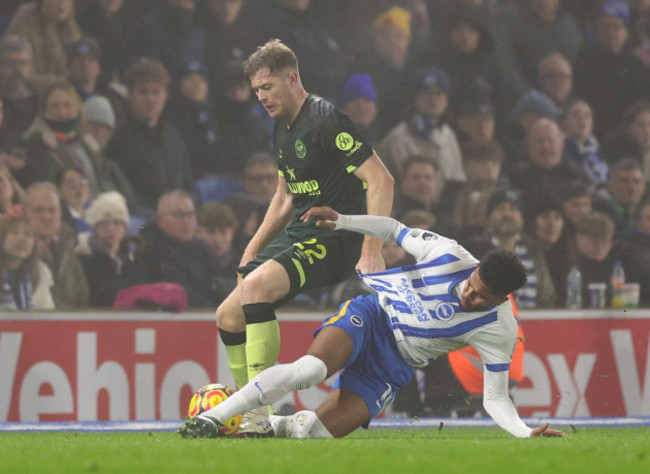 brentfords-nathan-collins-left-is-tackled-by-brighton-and-hove-albions-georginio-rutter-during-the-premier-league-match-at-the-amex-stadium-brighton-and-hove-picture-date-friday-december-27-20