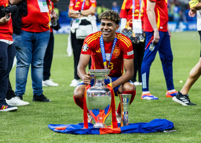 berlin-olympiastadion-14-07-2024-lamine-yamal-of-spain-wins-the-young-player-of-the-tournament-award-and-celebrates-with-both-trophys-after-the-final-match-at-the-uefa-euro-2024-spain-vs-england