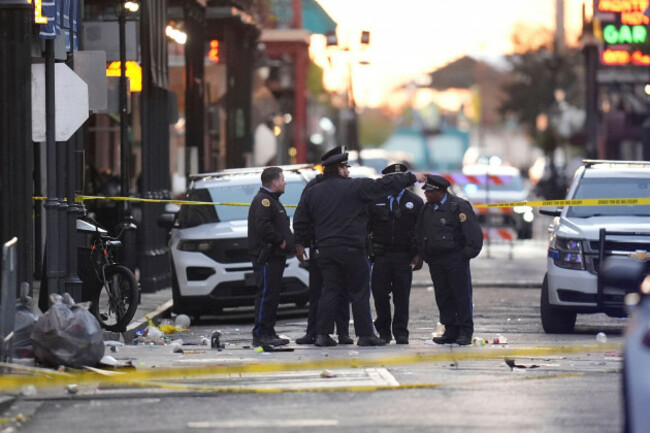 security-personnel-gather-at-the-scene-on-bourbon-street-after-a-vehicle-drove-into-a-crowd-on-new-orleans-canal-and-bourbon-street-wednesday-jan-1-2025-ap-photogerald-herbert