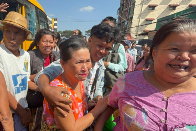 released-prisoners-front-center-and-right-are-welcomed-by-family-members-and-colleagues-outside-insein-prison-saturday-jan-4-2025-in-yangon-myanmar-as-the-military-government-has-released-more