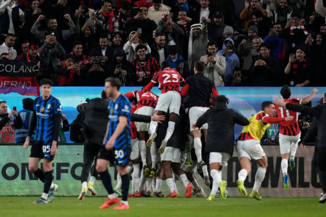 ac-milans-tammy-abraham-celebrates-with-teammates-after-scoring-his-sides-third-goal-during-the-italian-super-cup-final-soccer-match-between-ac-milan-and-inter-milan-at-al-awwal-park-stadium-in-riyad