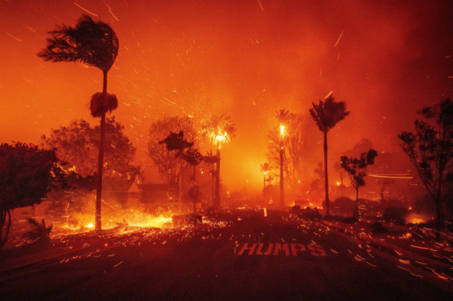 the-palisades-fire-ravages-a-neighborhood-amid-high-winds-in-the-pacific-palisades-neighborhood-of-los-angeles-tuesday-jan-7-2025-ap-photoethan-swope