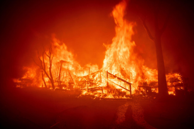 the-palisades-fire-burns-a-structure-in-the-pacific-palisades-neighborhood-of-los-angeles-tuesday-jan-7-2025-ap-photoethan-swope