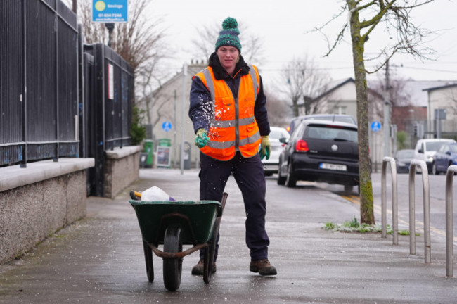 park-services-workers-from-dublin-city-council-gritting-footpaths-in-ballygall-in-dublin-ahead-of-a-status-orange-low-temperature-warning-issued-for-most-counties-on-wednesday-night-snow-and-sub-zero