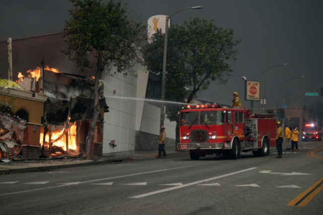 los-angeles-county-fire-dept-firefighters-battle-flames-at-the-iglesia-de-cristo-jehova-sabaoth-church-of-christ-jehovah-sabaoth-during-the-eaton-fire-wednesday-jan-8-2025-in-the-altadena-sect