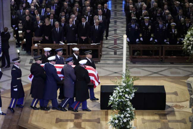 the-flag-draped-casket-of-former-president-jimmy-carter-arrives-for-a-state-funeral-at-washington-national-cathedral-in-washington-thursday-jan-9-2025-ap-photoben-curtis