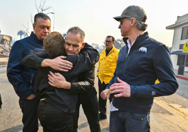 los-angeles-city-fire-captain-frank-lima-greets-los-angeles-mayor-karen-bass-as-she-joins-california-governor-gavin-newsom-right-and-senator-alex-padilla-d-calif-while-surveying-damage-during-t