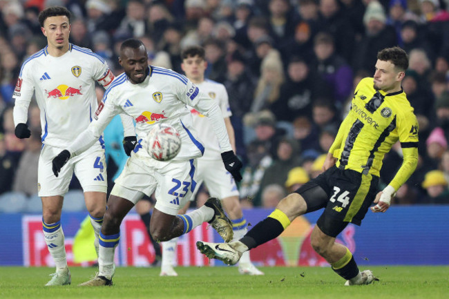 leeds-uniteds-josuha-guilavogui-and-harrogate-towns-josh-march-right-battle-for-the-ball-during-the-emirates-fa-cup-third-round-match-at-elland-road-leeds-picture-date-saturday-january-11-2025