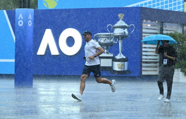 melbourne-australia-12th-jan-2025-rain-delays-play-on-the-outside-courts-during-the-2025-australian-open-at-melbourne-park-in-melbourne-sunday-january-12-2025-aap-imagejoel-carrett-no-archi