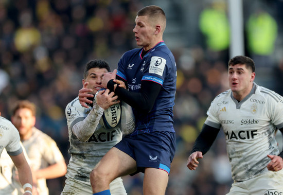 brice-dulin-and-sam-prendergast-compete-in-the-air-for-the-ball