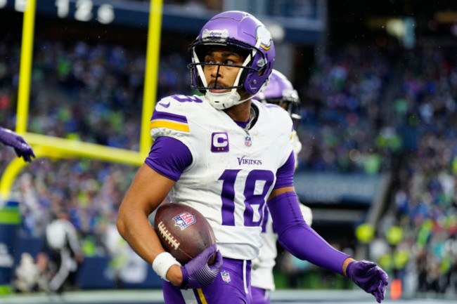 minnesota-vikings-wide-receiver-justin-jefferson-18-looks-on-after-scoring-a-touchdown-during-an-nfl-football-game-against-the-seattle-seahawks-sunday-dec-22-2024-in-seattle-the-vikings-defeate